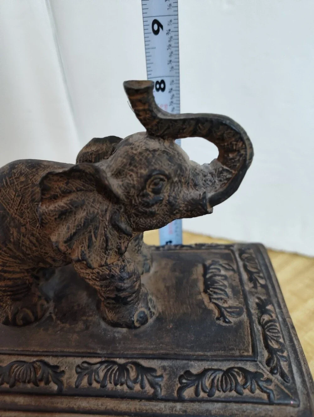 Ornate elephant trinket/jewelry box with raised elephant lid, floral relief desi